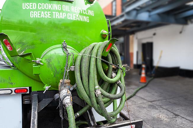 Grease Trap Cleaning of Loxahatchee workers